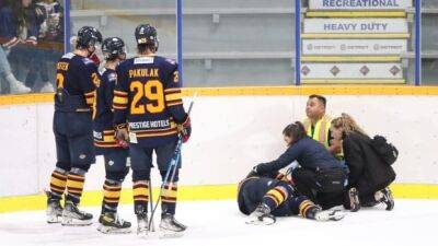 Junior hockey player with suspected head injury waits immobilized on ice rink for ambulance for nearly an hour - cbc.ca - Britain - county Kings - county Prince George