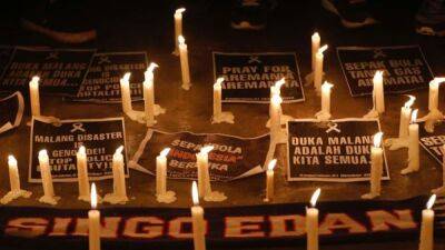 UEFA games to hold moment of silence in memory of Indonesian stadium disaster victims