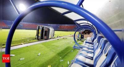 Fan loses wife, two teenage daughters in Indonesia soccer stampede - timesofindia.indiatimes.com - Indonesia