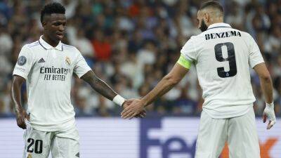 Champions Real Madrid power on with easy win against Shakhtar