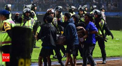 Indonesia police say 6 facing criminal charges over soccer stampede