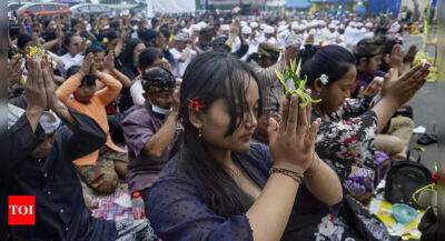 Fans mourn victims of Indonesian stadium crush at Friday prayers