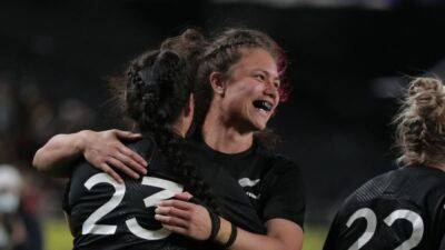 Rugby-New Zealand survive early scare to open home World Cup with a win