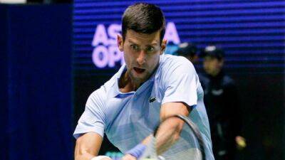 Djokovic into Astana final after surprise Medvedev retirement