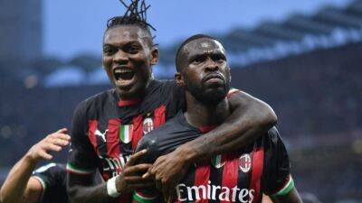 Soccer-Milan ease to 2-0 win over Juventus