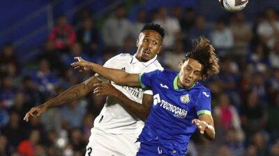 Luka Modric - Eder Militao - Soccer-Militao's early header earns Real Madrid win at Getafe - channelnewsasia.com - Spain