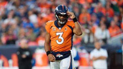 Sources - Broncos QB Russell Wilson has partially torn lat