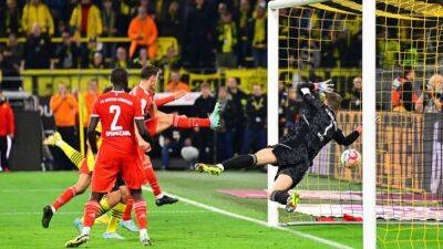 Last gasp Dortmund goal through Modeste rescues 2-2 against Bayern