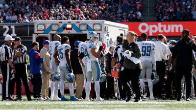 Lions' Saivion Smith taken off field in ambulance after suffering apparent neck injury
