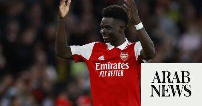 Arsenal beat Liverpool to go top, Scamacca leads West Ham revival