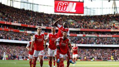 Bukayo Saka's double earns Arsenal thrilling victory over Liverpool