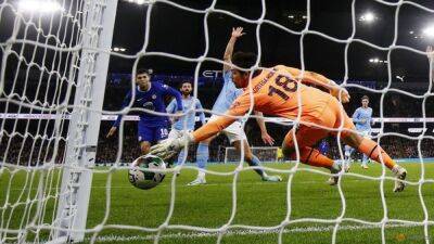 Liverpool survive shootout in League Cup, Man City see off Chelsea