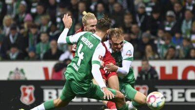 Leipzig edge past Werder 2-1 to finish year in second spot