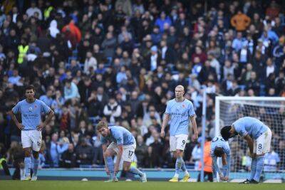 Man City stunned by Brentford, Spurs edge seven-goal thriller