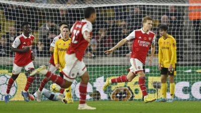 Arsenal beat Wolves 2-0 to extend Premier League lead