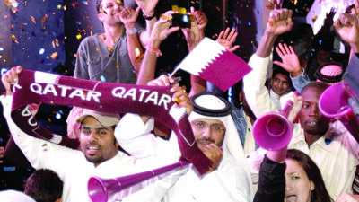 U.S. first team in as fans, trophy arrive for Qatar 2022 World Cup