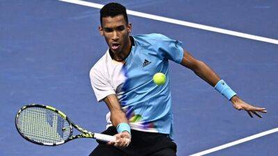 Auger-Aliassime rebounds at ATP Finals with first career win over top-seeded Nadal