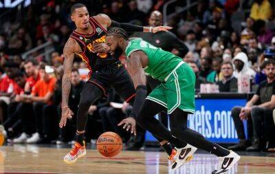 Celtics down Hawks, Suns beat Warriors despite Curry's 50