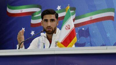 Iran's World Cup winger says focus is on playing, not political issues