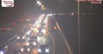 Crash closes two lanes of M4 causing hour long delays - Live updates