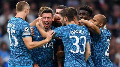 Spurs snatch winner in Marseilles to secure top spot