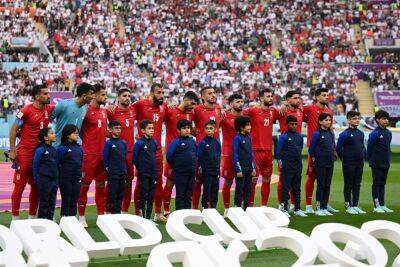 Iran team opt not to sing national anthem at World Cup in support of anti-government protestors
