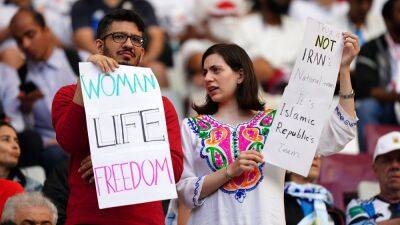 World Cup digest: FIFA ticket problems, Iranian players refuse to sing national anthem, concussion issues - rte.ie -  Doha - Iran