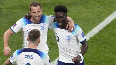 Dominant England hit six past plucky Iran in World Cup Group B opener