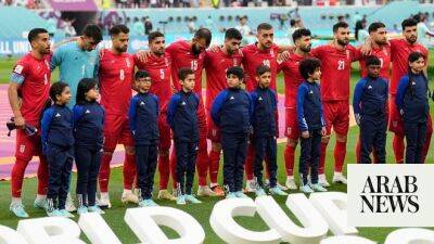 Iran national football team face political threats over anthem silence
