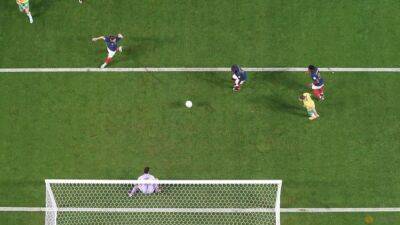 Olivier Giroud - Adrien Rabiot - Craig Goodwin - France lead Australia 2-1 at halftime - channelnewsasia.com - Qatar - France - Australia