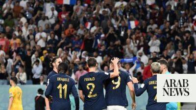 Giroud equals Henry mark as World Cup holders France sink Australia