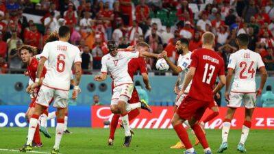 Denmark held by fired-up Tunisia in World Cup Group D opener