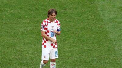Modric says first get through the group, then more for Croatia