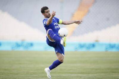 Iran arrests footballer over 'anti-state propaganda': media - news24.com - Qatar - Iran