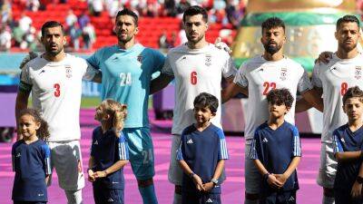 Iran team sing national anthem at World Cup