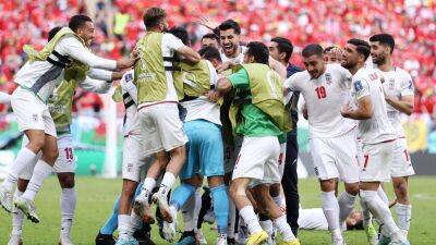 Iran hit ten-man Wales with injury-time sucker-punch
