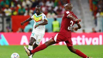 Hosts Qatar on verge of elimination after 3-1 loss to Senegal - channelnewsasia.com - Qatar - Netherlands - Spain -  Doha - Senegal - Ecuador