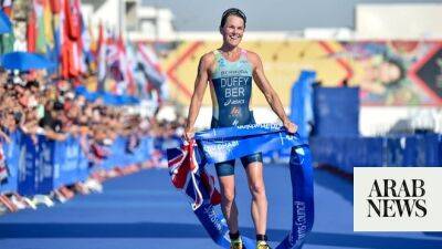Flora Duffy wins record fourth World Triathlon title in Abu Dhabi