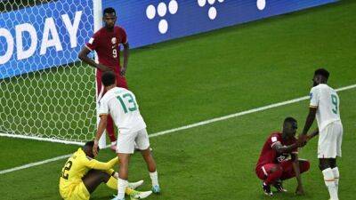 Louis Van-Gaal - Cody Gakpo - Hosts Qatar knocked out of World Cup as England made to wait - channelnewsasia.com - Qatar - Netherlands - Usa - South Africa -  Doha - Senegal - Iran - Ecuador