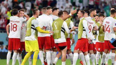 Plucky Poland near World Cup last 16 after stunning Saudi Arabia 2-0
