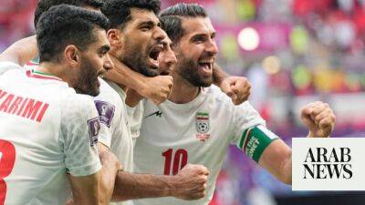 Vincent Aboubakar - Tehran slams US football body after modified Iran flag posts - arabnews.com - France - Netherlands - Serbia - Usa - Cameroon - Iran - state Minnesota - state Golden -  Tehran