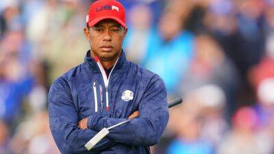 Injured Tiger pulls out of Hero World Challenge