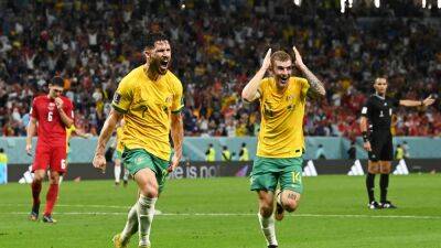 Australia shock Denmark to qualify for knockout stages for first time since 2006