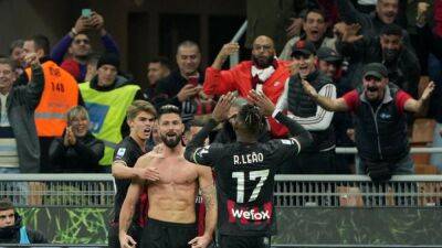 Milan's Giroud sent off after forgetting first yellow in win over Spezia