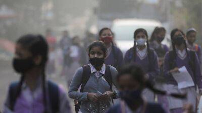 India presses rich countries to keep $100 billion climate pledge as smog shuts New Delhi schools