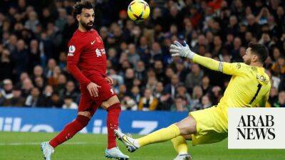 Salah double fires Liverpool to away win at Tottenham