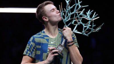 Holger Rune battles back in Paris final, denying Djokovic 39th Masters title