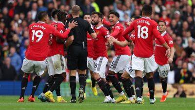 Manchester United fined for players twice surrounding referees