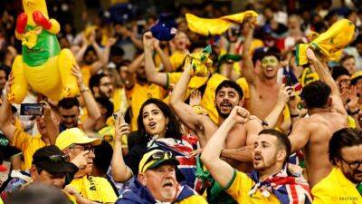 Australia in party mode as Socceroos reach World Cup knockouts