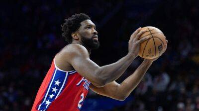 NBA roundup: Lakers rally, but Sixers win in OT